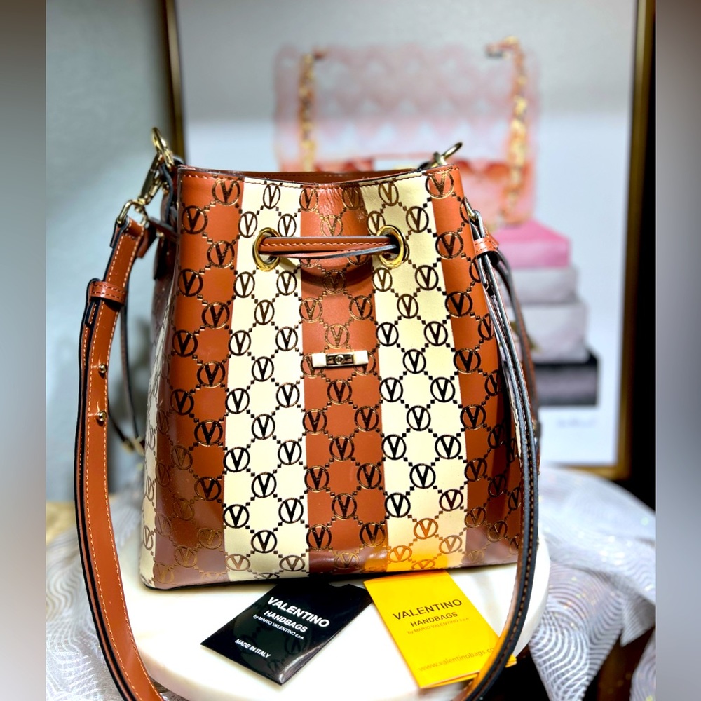 Valentino by Mario Valentino EUC logo leather bucket crossbody and shoulder bag